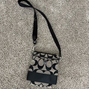 Coach Black and Tan Crossbody Bag with Signature Design